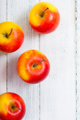 apple fruits on old white wooden table