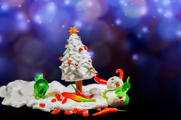 Christmas greeting card made with ingredients, with snowman and Christmas tree