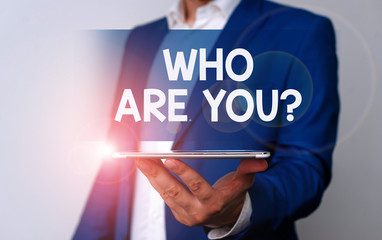 Handwriting text Who Are You Question. Conceptual photo asking about its identity or...