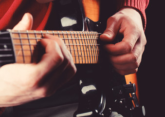 Fototapeta na wymiar Guitar acoustic. Electric guitar, guitarist, musician rock. Musical instrument. Guitars, strings. Music concept. Play the guitar. Live music. Music festival. Instrument on stage, band