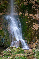 Fototapeta na wymiar cascade waterfall in a rocks