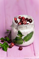 cranberry mint smoothie with cottage cheese in a glass jar on a wooden background