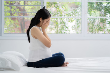 Pregnant woman feels stressed. and quarreling with her husband