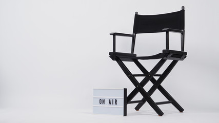 Black director chair and lightbox with word.It is used in video production,film and cinema industry on white background.