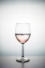 Paint swirling in water.