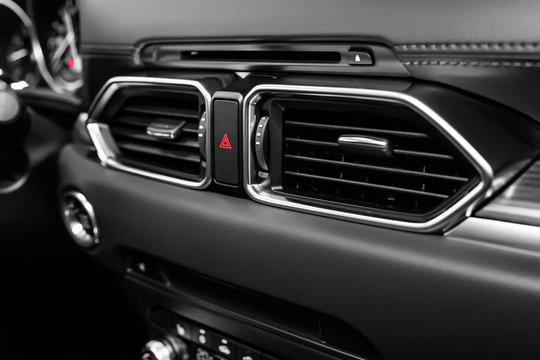 Close up car ventilation system and air conditioning - details and controls of modern car..