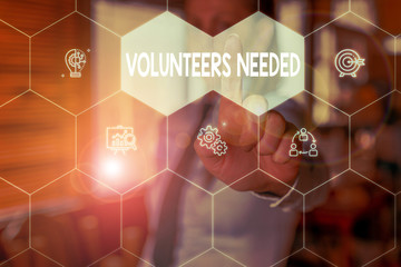 Conceptual hand writing showing Volunteers Needed. Concept meaning need work or help for...