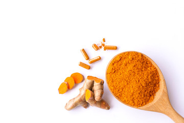 Turmeric powder in wooden spoon with curcuma ground root and tumeric capsules isolated on white background. Natural medicine plant,alternative medical healthcare and supplement concept.Top view.(flat) - Powered by Adobe