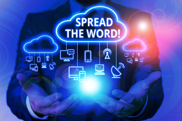 Text sign showing Spread The Word. Business photo showcasing share the information or news using social media Male human wear formal work suit presenting presentation using smart device