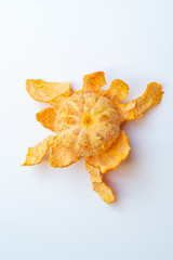 Fototapeta na wymiar A peeled mandarin isolated on white
