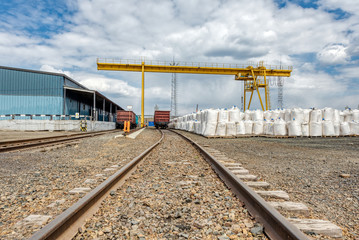 Obraz premium Industrial warehouse. A railroad has been brought to the warehouse.
