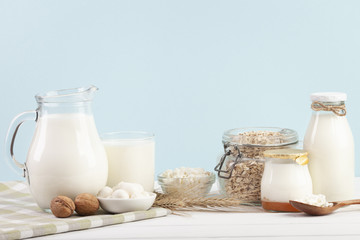 Arrangement of milk glass containers