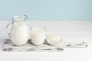 Chopping board with milk and cheese