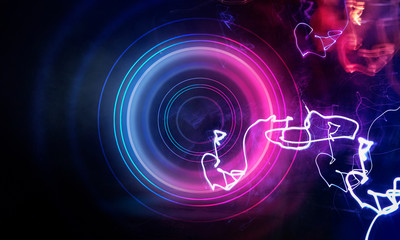 Neon circle on a dark street background, wet asphalt. Blue neon, smoke, smog. Night view of a street with neon. Abstract neon dark background.