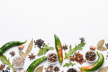 Different spices on white background