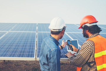 engineer working on checking equipment in solar power plant