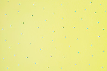 Blue stars on yellow backdrop.