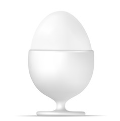 White boiled egg and egg cup