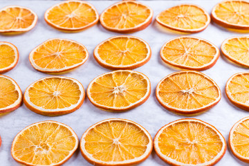 Dried oranges. Process of preparation of orange candied fruits for for New Year and Christmas party