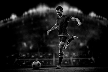 soccer player on black background