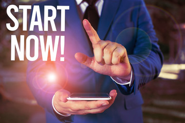 Text sign showing Start Now. Business photo showcasing do not hesitate get working or doing stuff right away Man with opened hands stands in suite. Concept with copy space and man