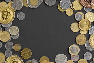 Top view of coins on dark background