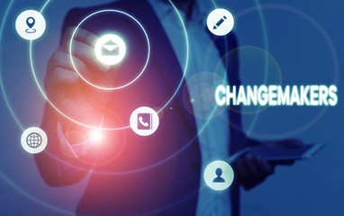 Conceptual hand writing showing Changemakers. Concept meaning Young Turk Influencers Acitivists Urbanization Fashion Gen X