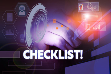 Text sign showing Checklist. Business photo showcasing list items required things be done or points considered Male human wear formal work suit presenting presentation using smart device