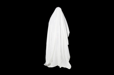 Ghost outdoors isolated on black background. Halloween costume idea. Horror film concept. Scary...