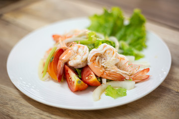 Spicy salad with fresh shrimps healthy asian food for diet lifestyle.
