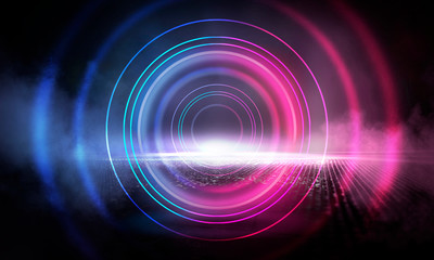 Neon circle on the background of a dark old brick wall, street, wet asphalt. Blue and pink neon, smoke, smog. Night view of the street with neon. Abstract neon dark background.