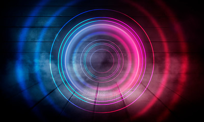 Neon circle on the background of a dark old brick wall, street, wet asphalt. Blue and pink neon, smoke, smog. Night view of the street with neon. Abstract neon dark background.