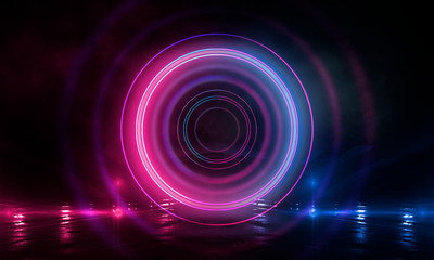 Neon circle on the background of a dark old brick wall, street, wet asphalt. Blue and pink neon, smoke, smog. Night view of the street with neon. Abstract neon dark background.