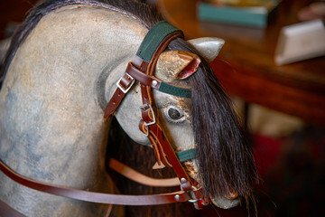 Close up of an antique rocking horse head