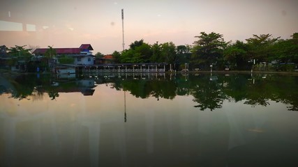 Obraz premium sunset on the river