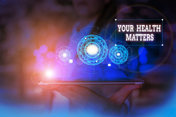 Text sign showing Your Health Matters. Business photo text good health is most important among other things Woman wear formal work suit presenting presentation using smart device