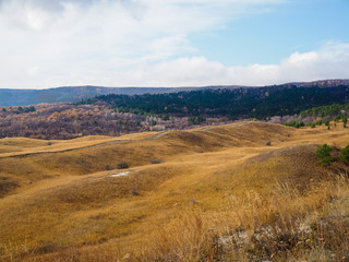 hilly autumn landscape on a cloudy day