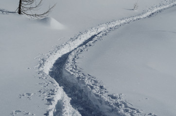 Winter mountains. Track in the snow.