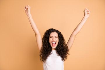 Photo of amazing yelling lady listening great advertising sale shopping triumphing raising fists...