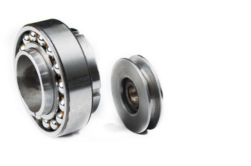 Ball bearing and pulley isolated on white background.Copy space