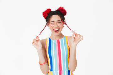 Image of funny nice woman winking and looking at camera
