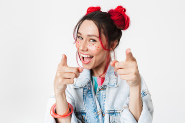 Image closeup of joyful woman smiling and pointing fingers at camera