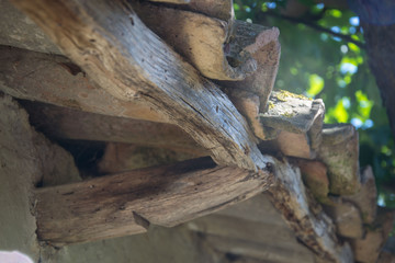 Close-up of damaged wood, rooftop details. Texture and details, rural background