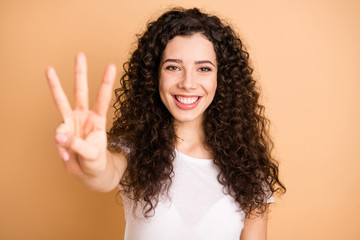 I'm counting to three. Closeup photo of funny lady raising hand showing three fingers positive mood...