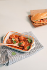 Banh Mi Xiu Mai is a popular pork ball sandwich with tomato sauce in Vietnam