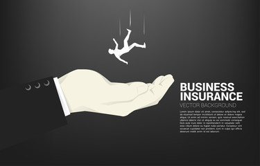 silhouette of businessman falling down in big hand. Concept for safety and insurance business