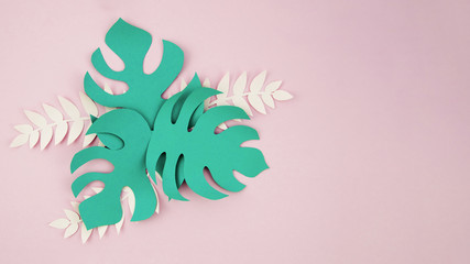 Green artificial foliage from paper style with copy space