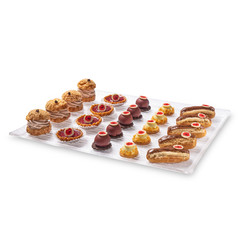 Group of french dessert Eclair on white background.