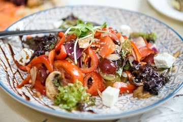 Delicious salad on plate close up. Food and restaurant concept