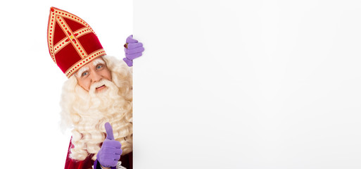 Sinterklaas holding blank cardboard